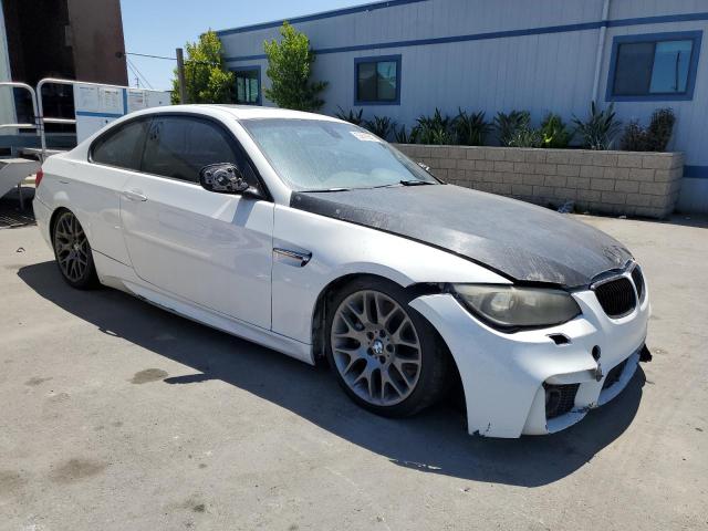 WBAKG1C58BE617912 - 2011 BMW 335 IS WHITE photo 4