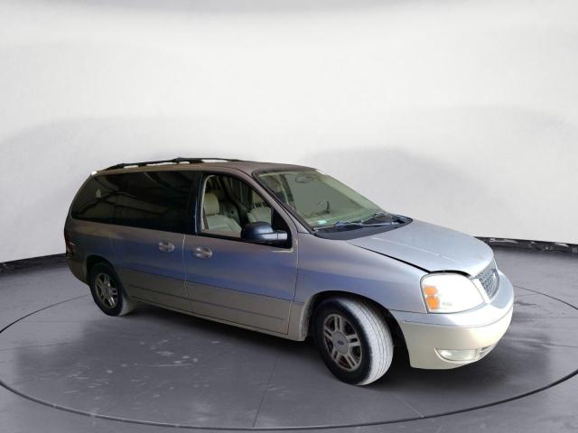 2FMDA58264BA77991 - 2004 FORD FREESTAR LIMITED SILVER photo 4