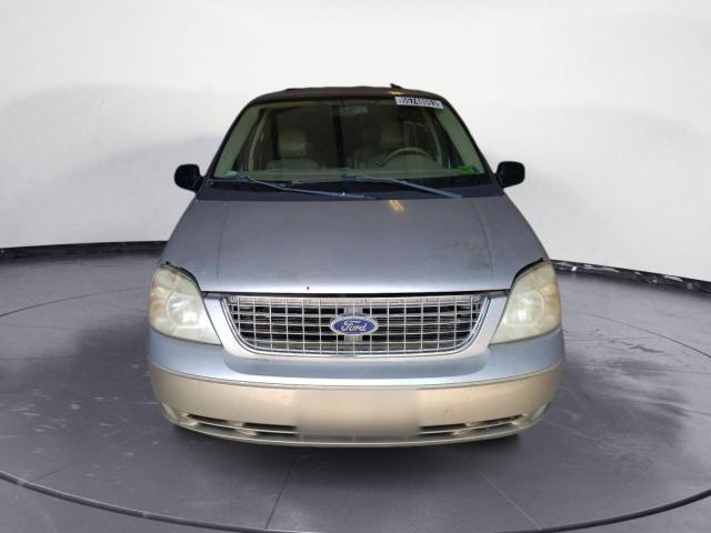 2FMDA58264BA77991 - 2004 FORD FREESTAR LIMITED SILVER photo 5