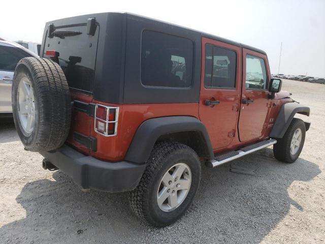 1J4GA39199L711873 - 2009 JEEP WRANGLER U X ORANGE photo 3