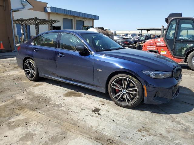 3MW39FS02P8C97353 - 2023 BMW 330XE ლურჯი ფოტო 4