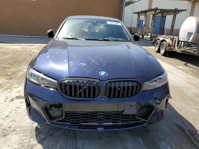 3MW39FS02P8C97353 - 2023 BMW 330XE ლურჯი ფოტო 5