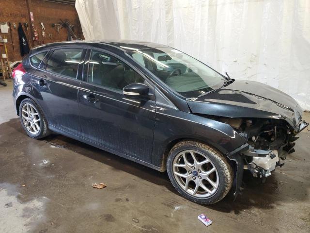 1FADP3K24FL297624 - 2015 FORD FOCUS SE BLACK photo 4