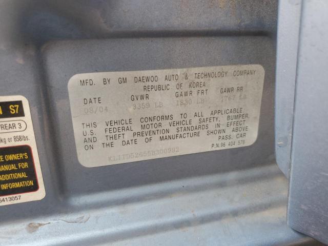 KL1TD52655B300992 - 2005 CHEVROLET AVEO BASE Mavi foto 12