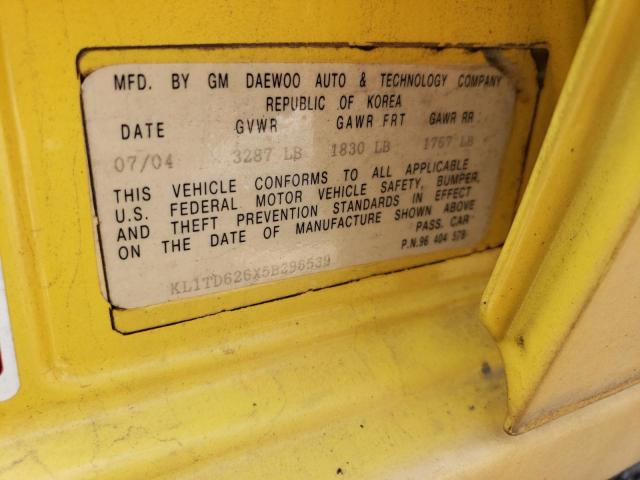 KL1TD626X5B296539 - 2005 CHEVROLET AVEO BASE YELLOW photo 12