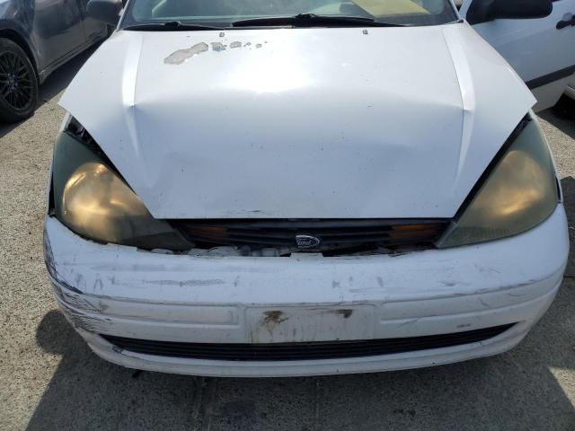 1FAFP33Z54W173698 - 2004 FORD FOCUS LX WHITE photo 7