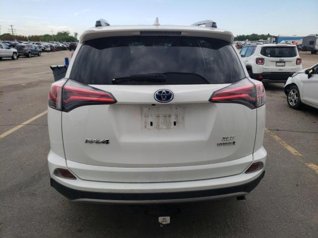 JTMRJREV0JD240706 - 2018 TOYOTA RAV4 HV LE WHITE photo 6