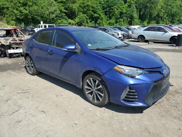 5YFBURHE5KP869686 - 2019 TOYOTA COROLLA L BLUE photo 4