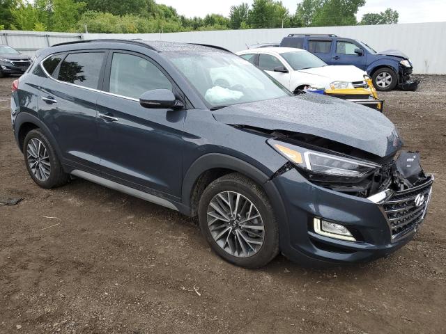 KM8J33AL2MU410315 - 2021 HYUNDAI TUCSON LIMITED BLUE photo 4