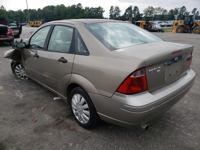 1FAFP34N05W180605 - 2005 FORD FOCUS ZX4 GOLD photo 3