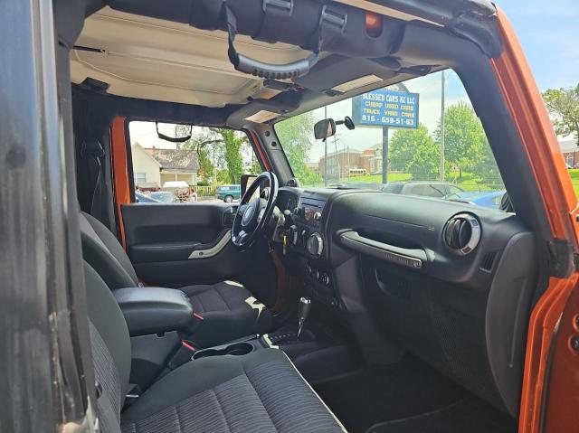 1J4AA2D16BL584318 - 2011 JEEP WRANGLER SPORT ORANGE photo 5