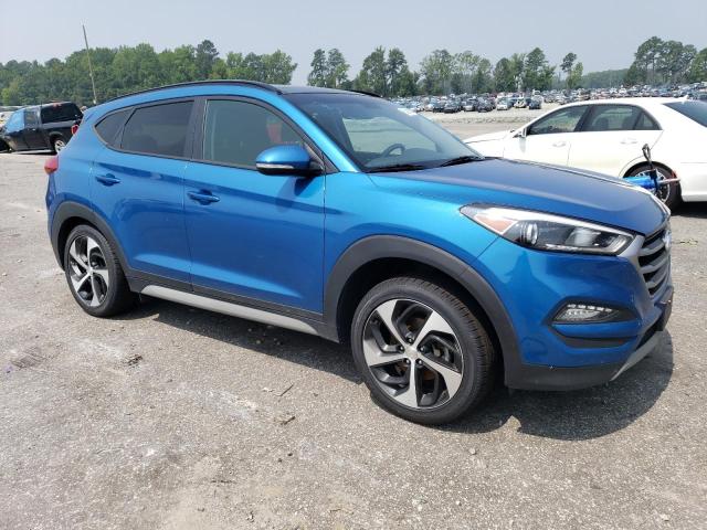 KM8J3CA2XJU783962 - 2018 HYUNDAI TUCSON VALUE BLUE photo 4