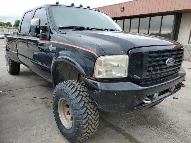 1FTSW31PX4EC58880 - 2004 FORD F350 SRW SUPER DUTY BLACK photo 4