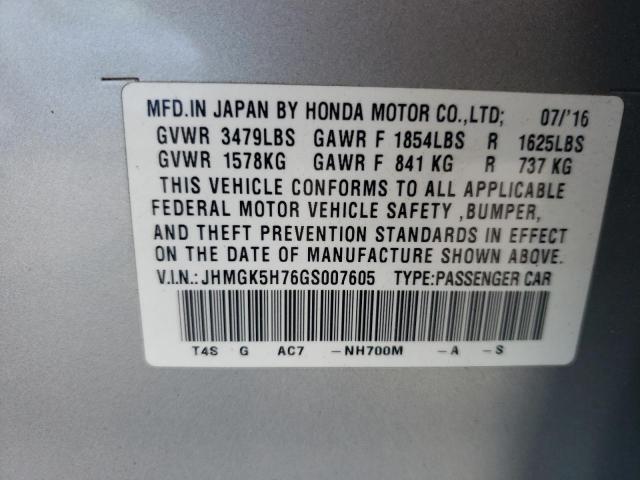 JHMGK5H76GS007605 - 2016 HONDA FIT EX SILVER photo 12