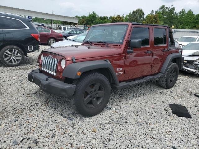 1J4GB39189L723932 - 2009 JEEP WRANGLER U X RED photo 1