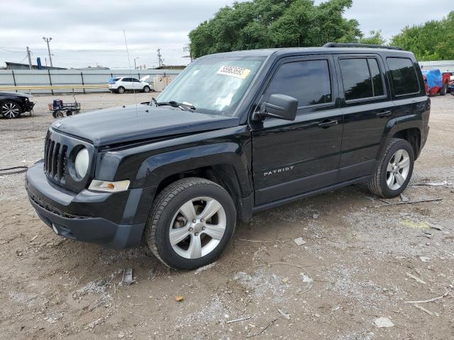 1C4NJRFB1ED653212 - 2014 JEEP PATRIOT LATITUDE BLACK photo 1