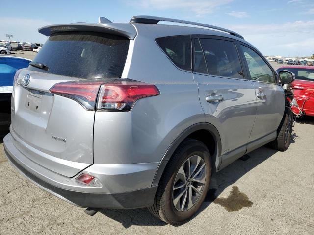 JTMRJREV6JD225658 - 2018 TOYOTA RAV4 HV LE SILVER photo 3