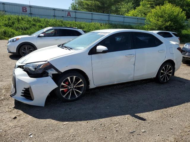 5YFBURHE2HP581603 - 2017 TOYOTA COROLLA L WHITE photo 1