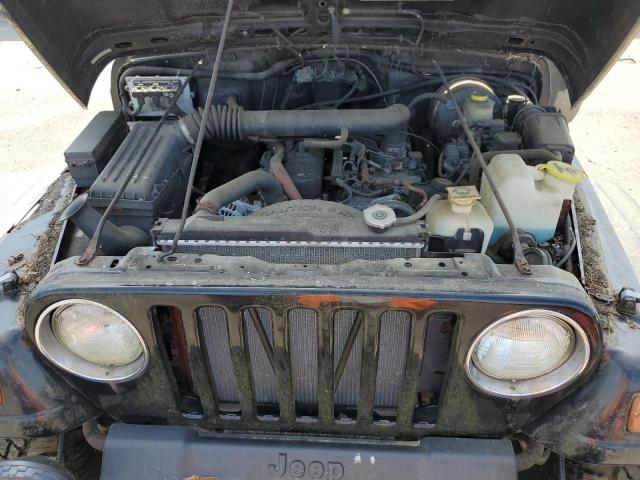 1J4FA49S9YP726777 - 2000 JEEP WRANGLER / SPORT BLACK photo 11