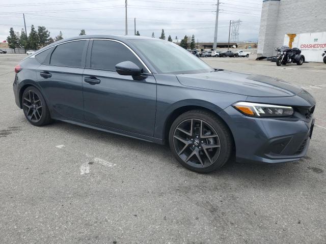 19XFL1H80RE020898 - 2024 HONDA CIVIC SPORT TOURING BLUE photo 4