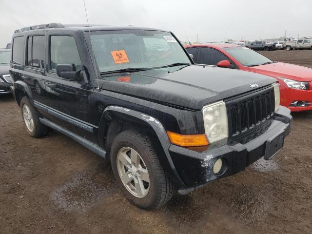 1J8HG48N26C179082 - 2006 JEEP COMMANDER BLACK photo 4