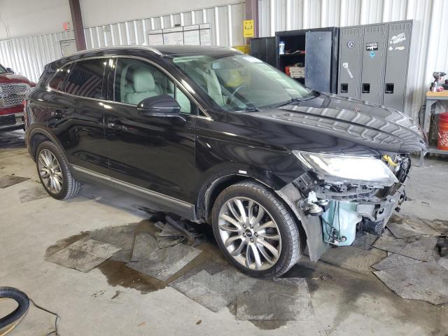 5LMCJ1A97FUJ37024 - 2015 LINCOLN MKC BLACK photo 4