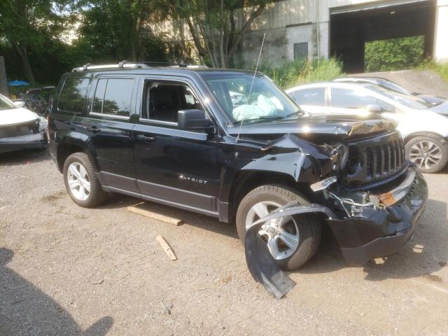 1C4NJRCB4ED708417 - 2014 JEEP PATRIOT LIMITED BLACK photo 4