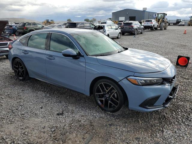 19XFL1H84PE001090 - 2023 HONDA CIVIC SPORT TOURING BLUE photo 4