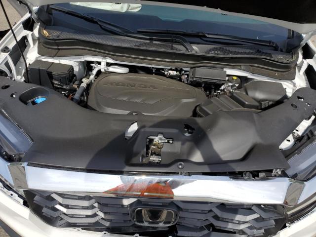 5FNYF8H55PB002614 - 2023 HONDA PASSPORT EXL თეთრი ფოტო 12