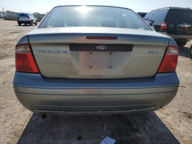 1FAFP34N25W214009 - 2005 FORD FOCUS ZX4 GRAY photo 6