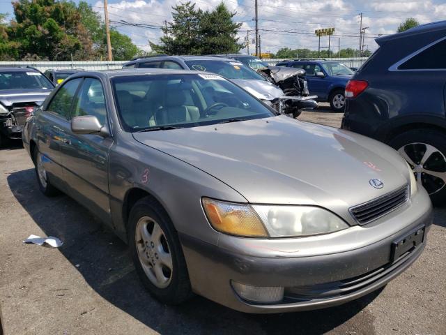 JT8BF28GXX0234482 - 1999 LEXUS ES 300 GRAY photo 4