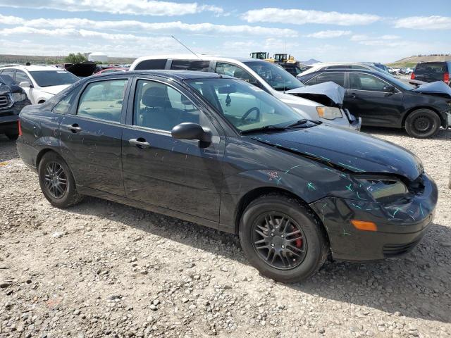 1FAHP34N77W290403 - 2007 FORD FOCUS ZX4 BLACK photo 4