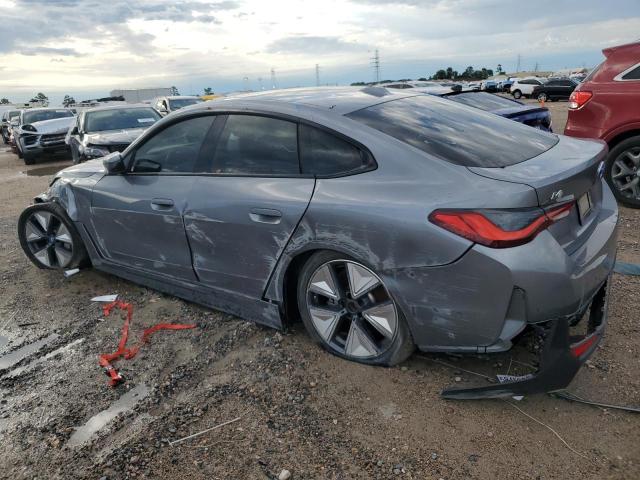 WBY43AW02PFP44405 - 2023 BMW I4 EDRIVE 35 GRAY photo 2