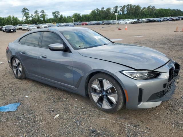 WBY43AW02PFP44405 - 2023 BMW I4 EDRIVE 35 GRAY photo 4