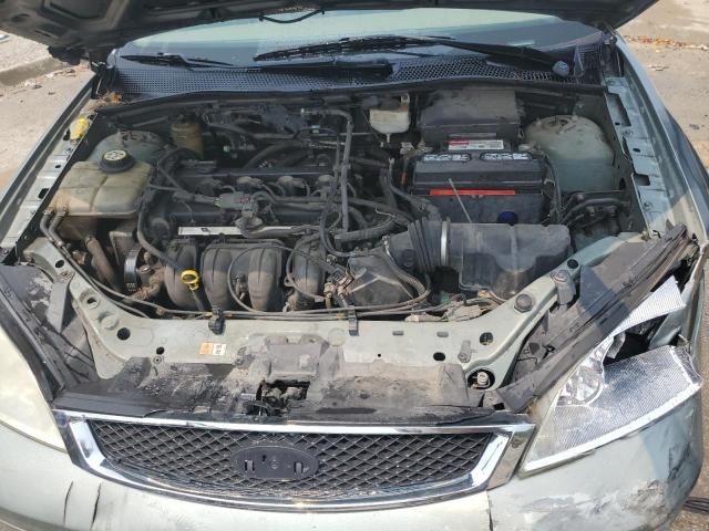 1FAFP34N86W120797 - 2006 FORD FOCUS ZX4 TURQUOISE photo 11