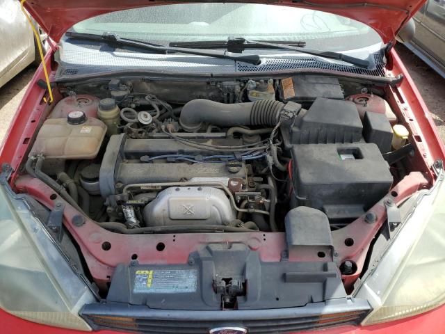 3FAFP31354R111140 - 2004 FORD FOCUS ZX3 RED photo 11