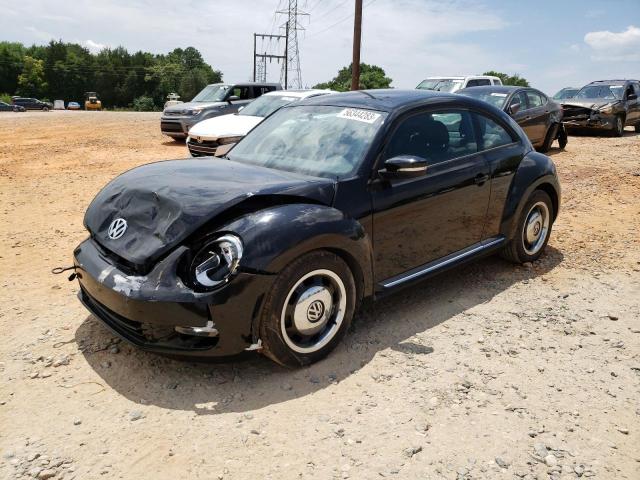 3VWJX7AT5CM645758 - 2012 VOLKSWAGEN BEETLE BLACK photo 1