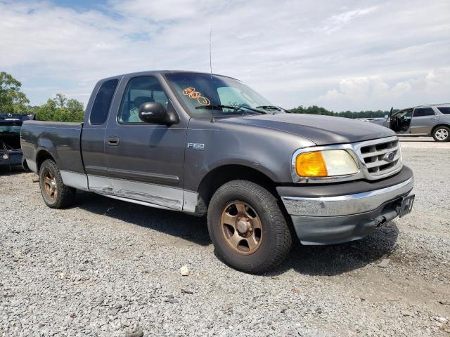 2FTRX172X4CA02711 - 2004 FORD F-150 HERI CLASSIC GRAY photo 4