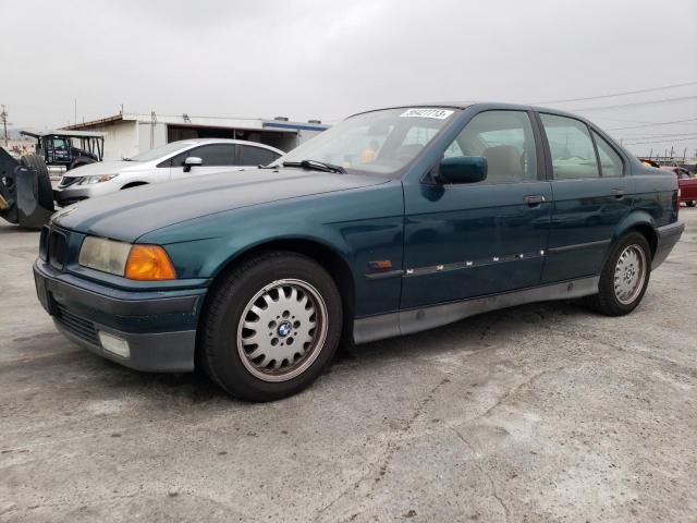 WBACA6326SFK70244 - 1995 BMW 318 I AUTOMATIC GREEN photo 1