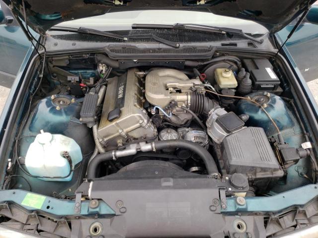 WBACA6326SFK70244 - 1995 BMW 318 I AUTOMATIC GREEN photo 11
