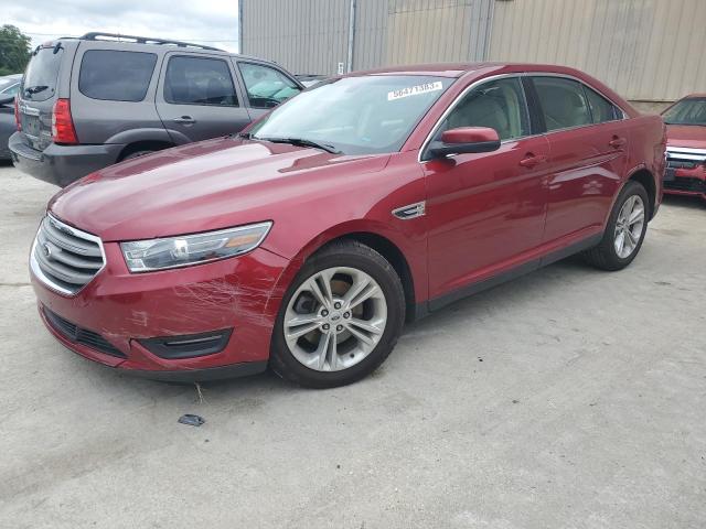 1FAHP2E81GG157598 - 2016 FORD TAURUS SEL RED photo 1