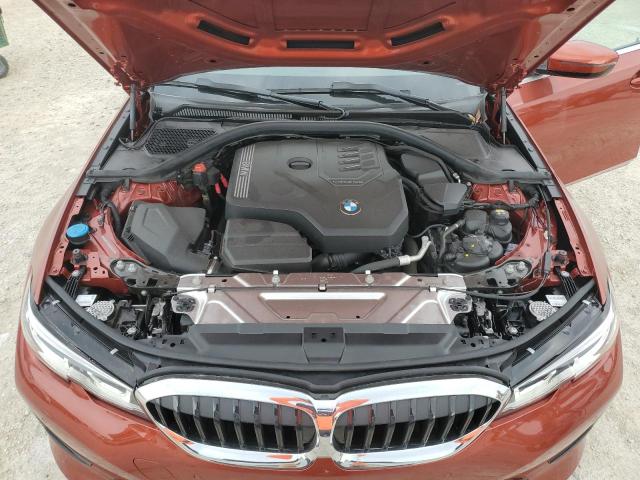 3MW5R7J03N8C69512 - 2022 BMW 330XI ORANGE photo 11