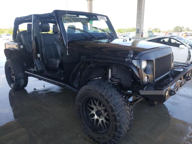 1C4BJWDG4GL246168 - 2016 JEEP WRANGLER U SPORT შავი ფოტო 1