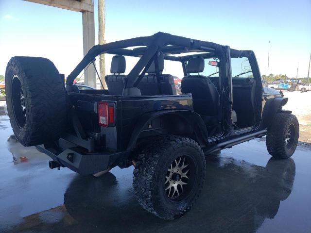 1C4BJWDG4GL246168 - 2016 JEEP WRANGLER U SPORT შავი ფოტო 4