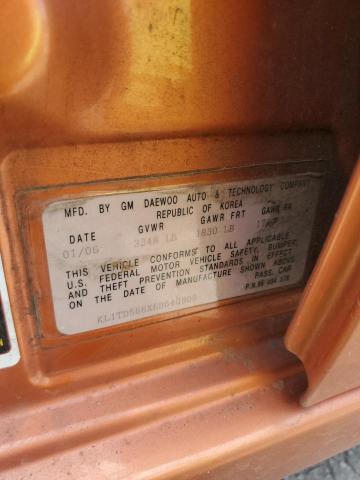 KL1TD566X6B640909 - 2006 CHEVROLET AVEO BASE ნარინჯისფერი ფოტო 12