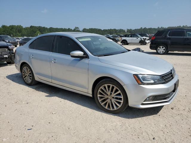 3VWL07AJ0GM332196 - 2016 VOLKSWAGEN JETTA SEL SILVER photo 4