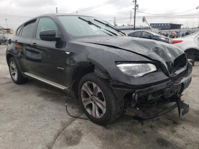 5UXFG2C59E0H11195 - 2014 BMW X6 XDRIVE35I BLACK photo 4