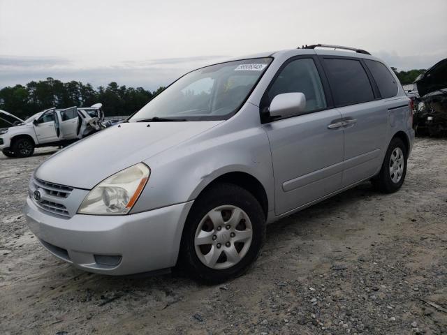 KNDMB133296320423 - 2009 KIA SEDONA SILVER photo 1