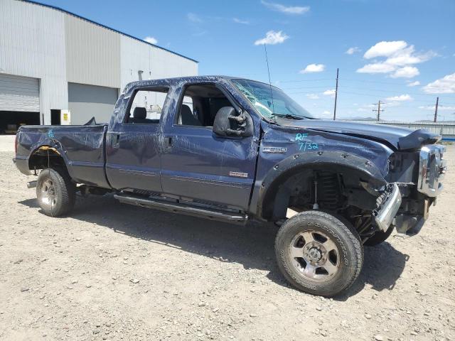 1FTWW31P45ED31129 - 2005 FORD F350 SRW SUPER DUTY BLUE photo 4