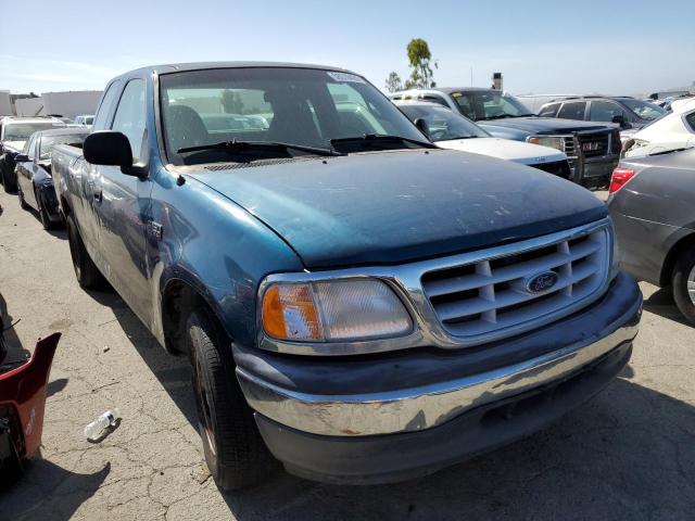 1FTZX17231NA13328 - 2001 FORD F150 BLUE photo 4